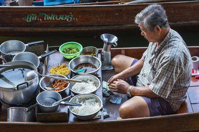 Private Guided Tour to Train Market and Damnoensaduak Floating Market - Damnoensaduak Floating Market: long-tail boat views plus time on the canals