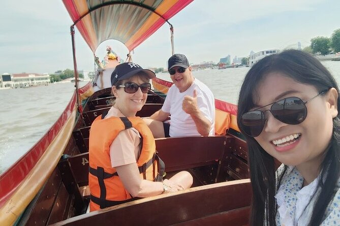 Private Longtail Boat Bangkok Canal Tour - Stop 1: Pak Khlong Flower Talat, big market energy in about an hour