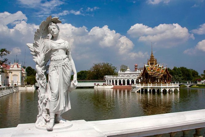 Private Tour : Ayutthaya Sightseeing by Coach return by Cruise - Wat Mahathat: the Buddha head and the Bodhi Tree connection