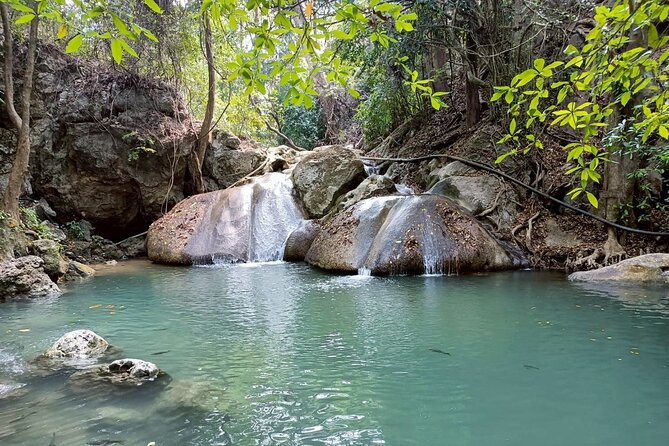 Private Tour to Erawan Waterfall and Boat Tour in Kanchanaburi - Wat Tham Khao Poon area and the Phra That Si Mueang Kan Chedi stop