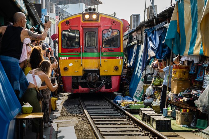 Private Tour to Maeklong Railway Market and Floating Market - Entering Maeklong Railway Market, the moment the track becomes the stage