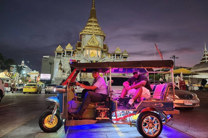 Private Tuk Tuk Night Adventure with Dinner - Democracy Monument, a quick stop with real city-center meaning