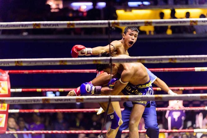 Real Muay Thai boxing at Rajadamnern Stadium - The Muay Thai background you’ll spot in the ring