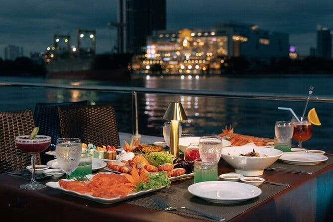 Scenic Bangkok Unicorn Dinner Cruise on Chao Phraya River - Rama VIII Bridge, Taksin Bridge, and the riverfront energy