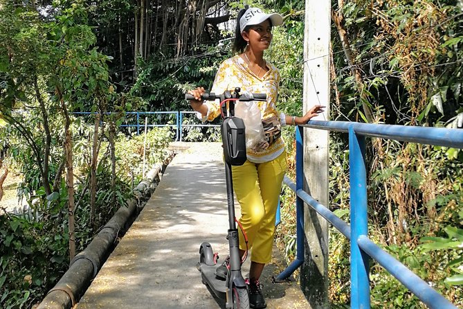 Take a E-Scooter Ride in Bangkok's Jungle - Meeting at Wat Khlong Toei Nok Pier, then ferry time
