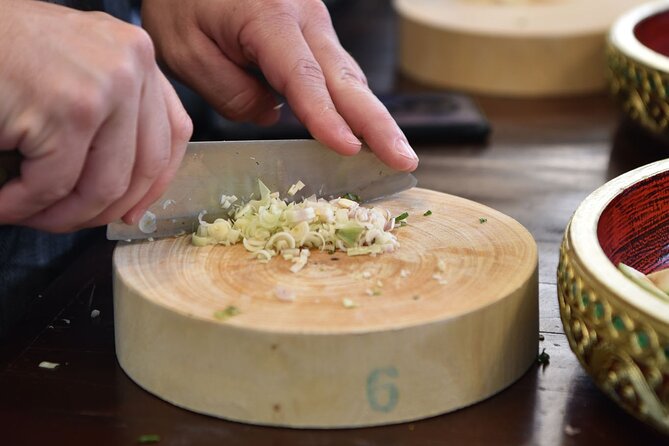 Thai Cooking Class with Market Tour in Sathon Bangkok - Cooking coconut milk and curry paste from scratch
