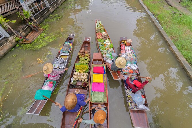 Train & Floating Market Food Adventure + Scenic train ride - Stop 1: Mae Klong Railway Market, early timing and train-station energy