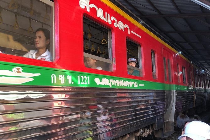 Train Market and Floating Market half day tour - Damnoen Saduak Floating Market: Paddle Through Canal Shopping