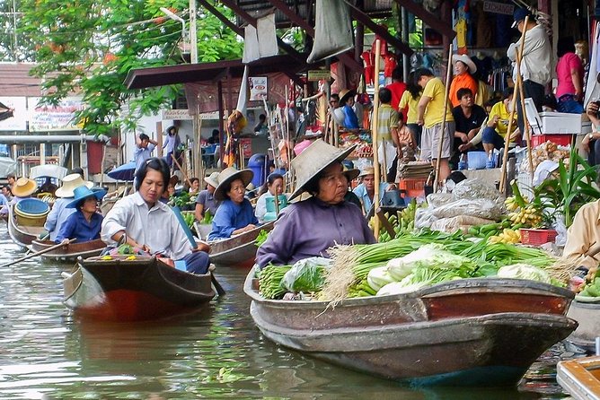 Unique Bangkok Markets: Train Market & Floating Market Adventure - Mae Klong Railway Market: The Umbrella Pulldown Moment and Why It Matters