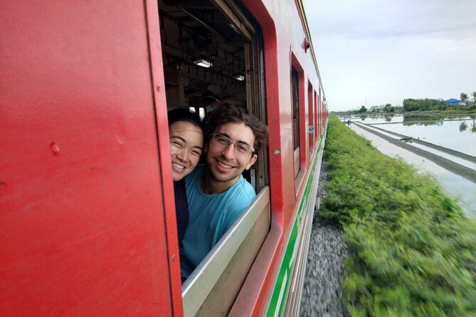 Wheelchair & Luxury Tour to Floating & Railway Markets - Damnoen Saduak Floating Market, canals, boats, and real vendor activity